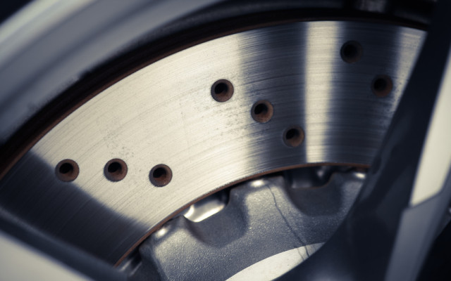 Close-up shot of a car's brake disc.